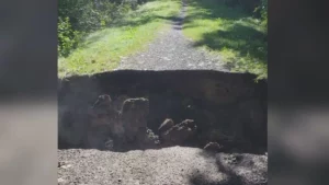 massive-sinkhole-closes-stretch-of-hojack-trail-in-webster